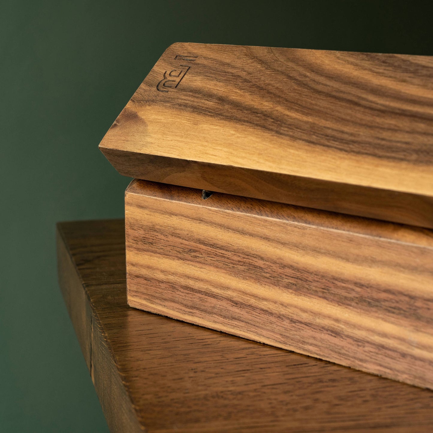 Blackwing walnut gift box showing branding and opening hinge.