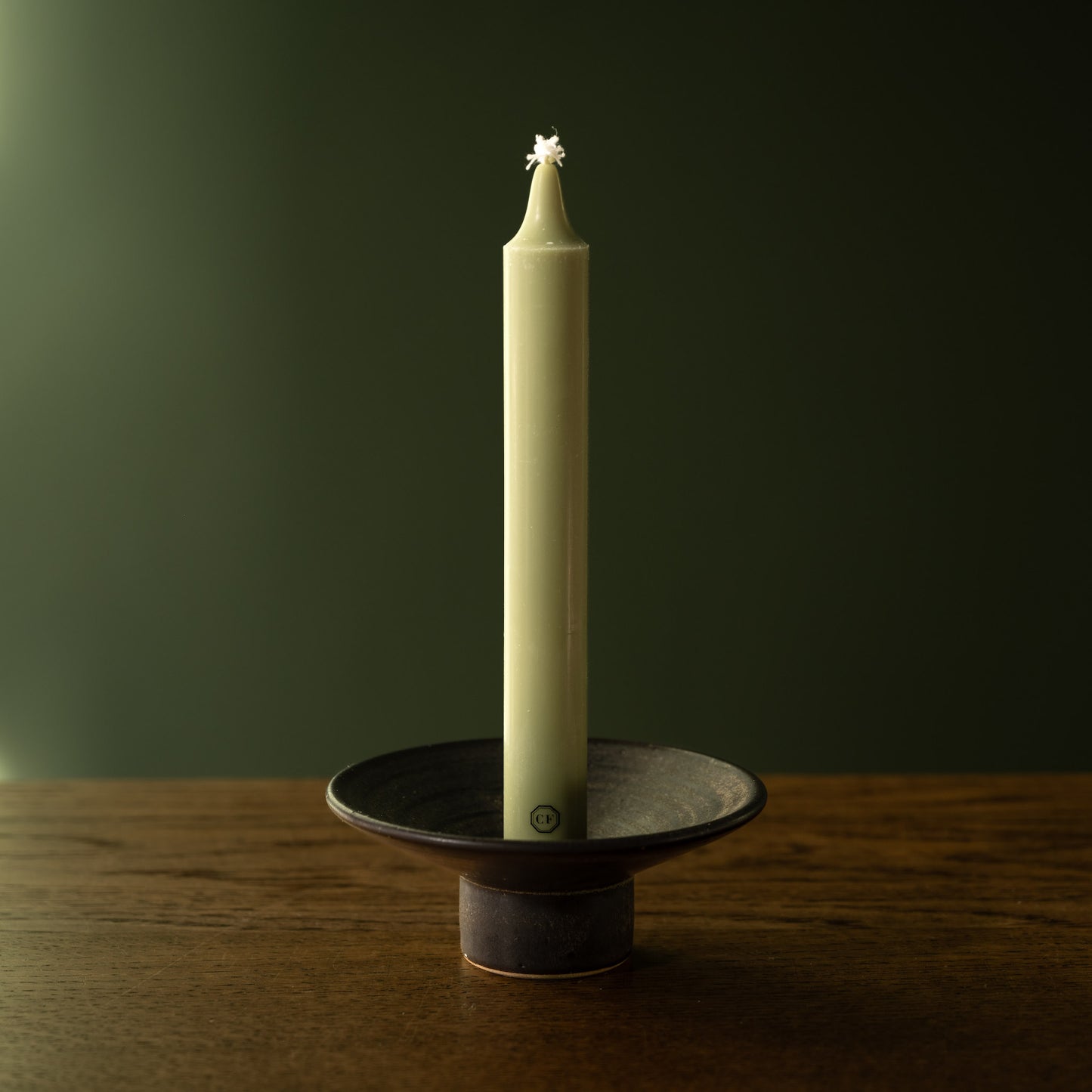 Carriere Freres Spearmint Taper Candle & ceramic stoneware candle holder.