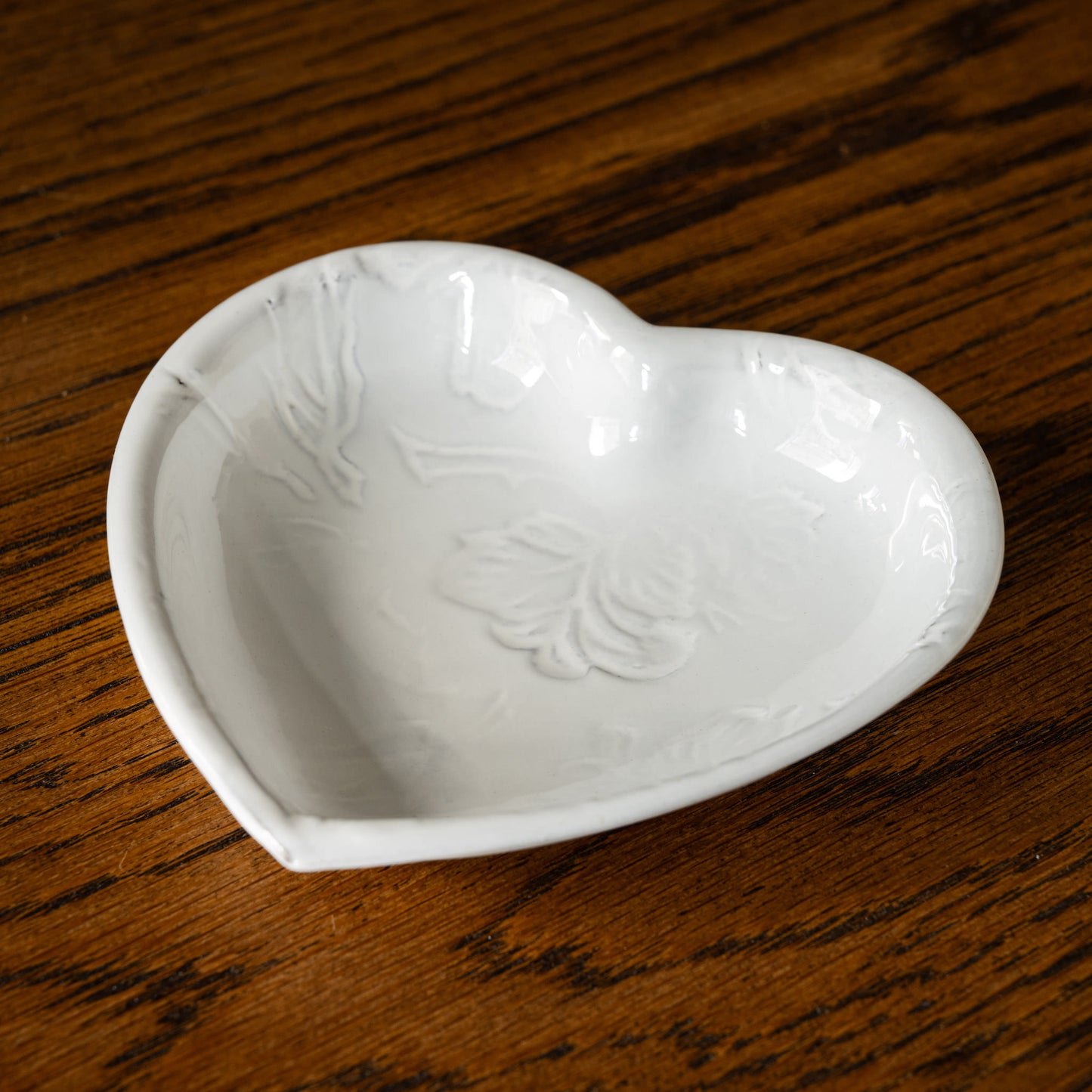 Carron Paris Pivoine Heart Shaped Dish with embossed peony flower design finished in a milky white glaze.