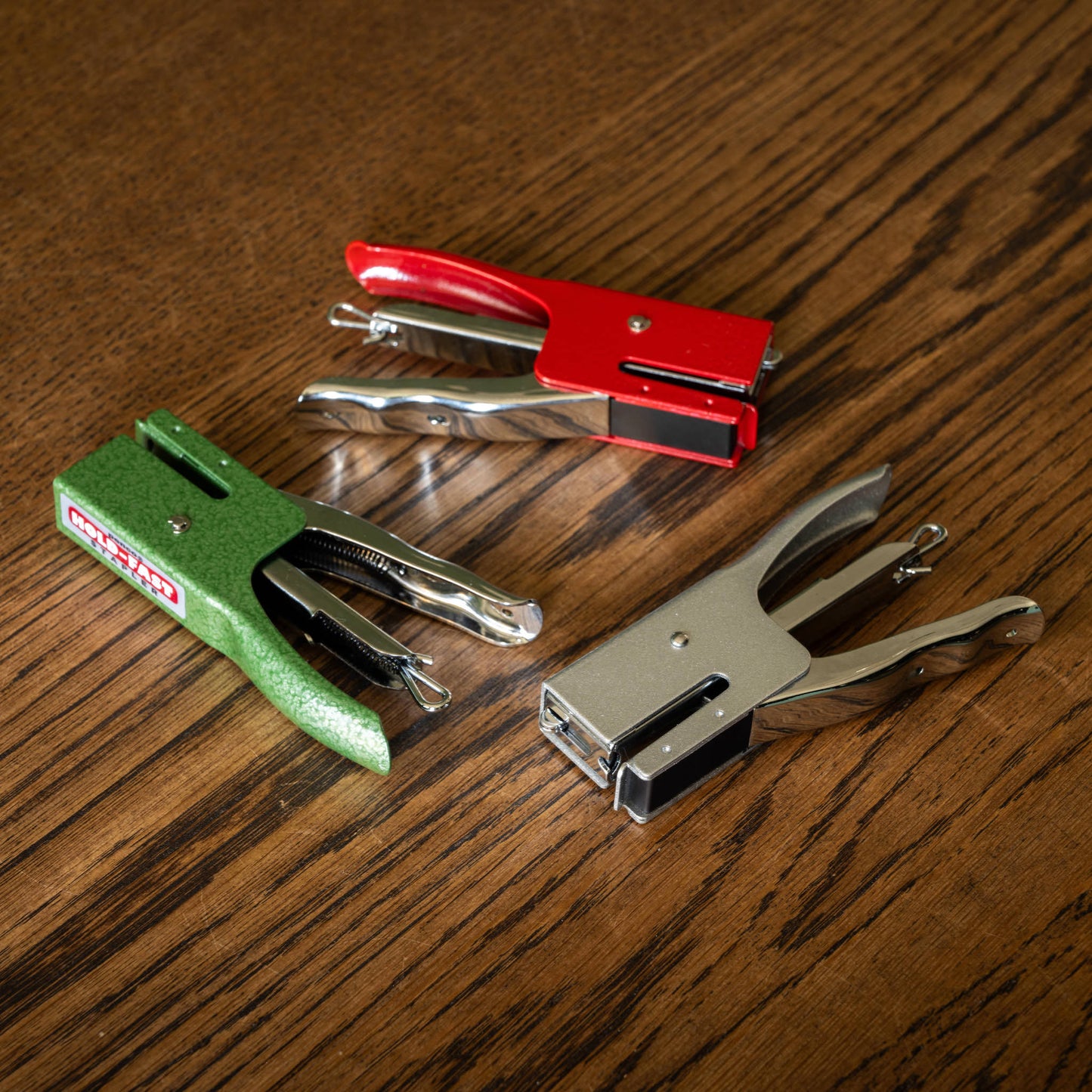 Penco staplers in silver, green & red