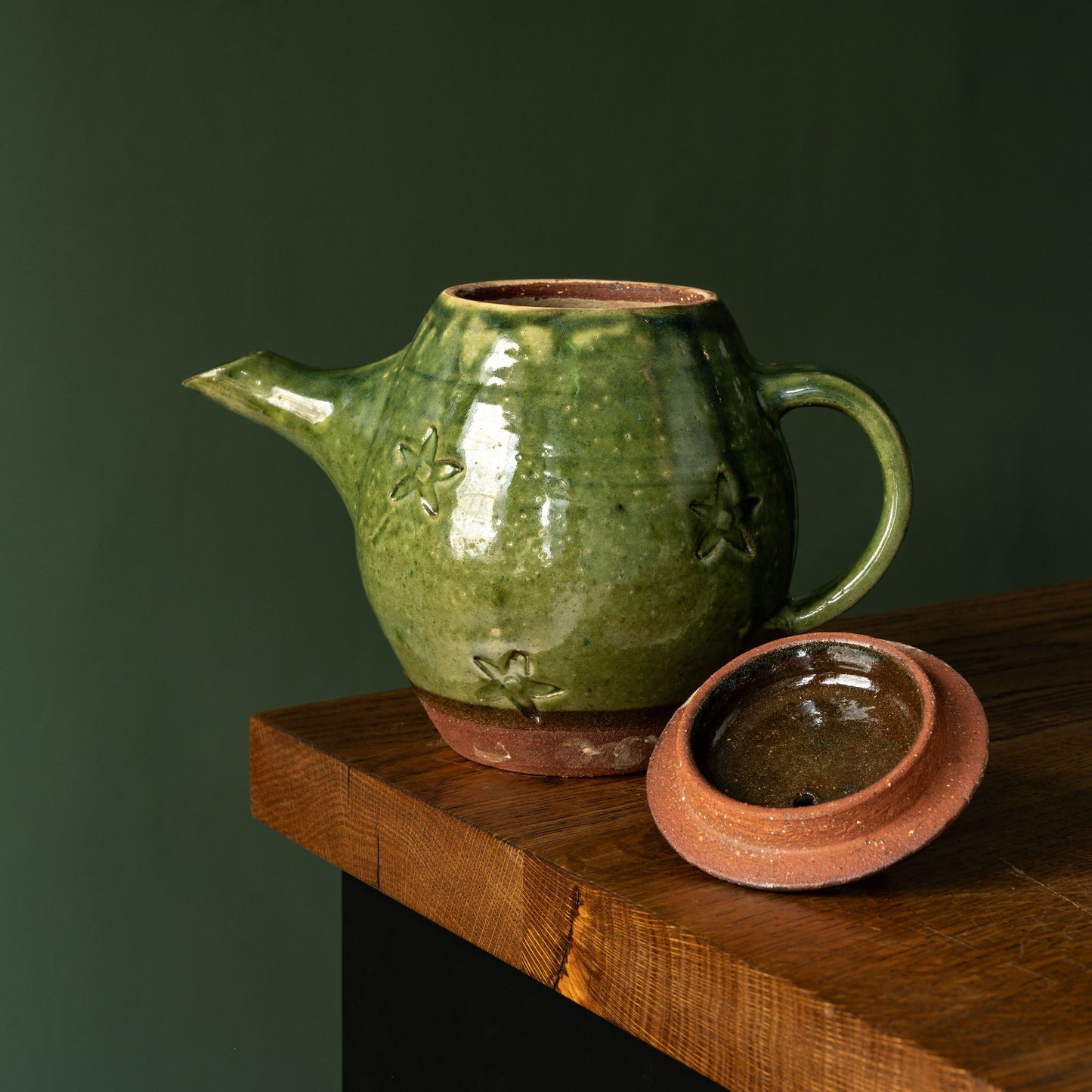 Joshua Williams green earthenware teapot and lid