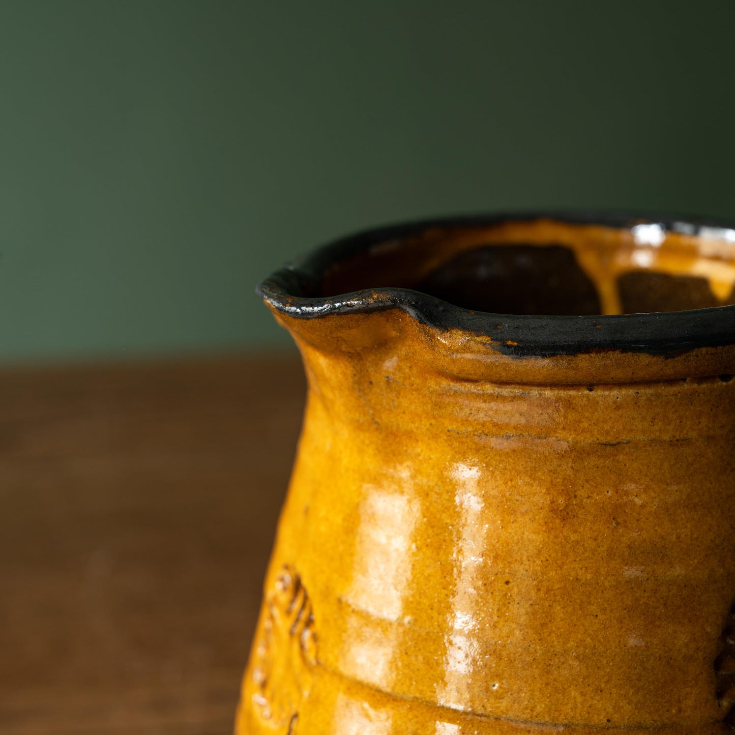 Close-up of Joshua Williams ochre earthenware jug spout