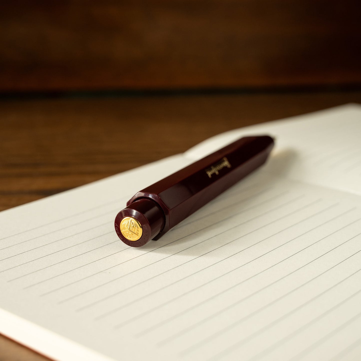 Kaweco Classic Sport Bordeaux pencil on a lined notebook