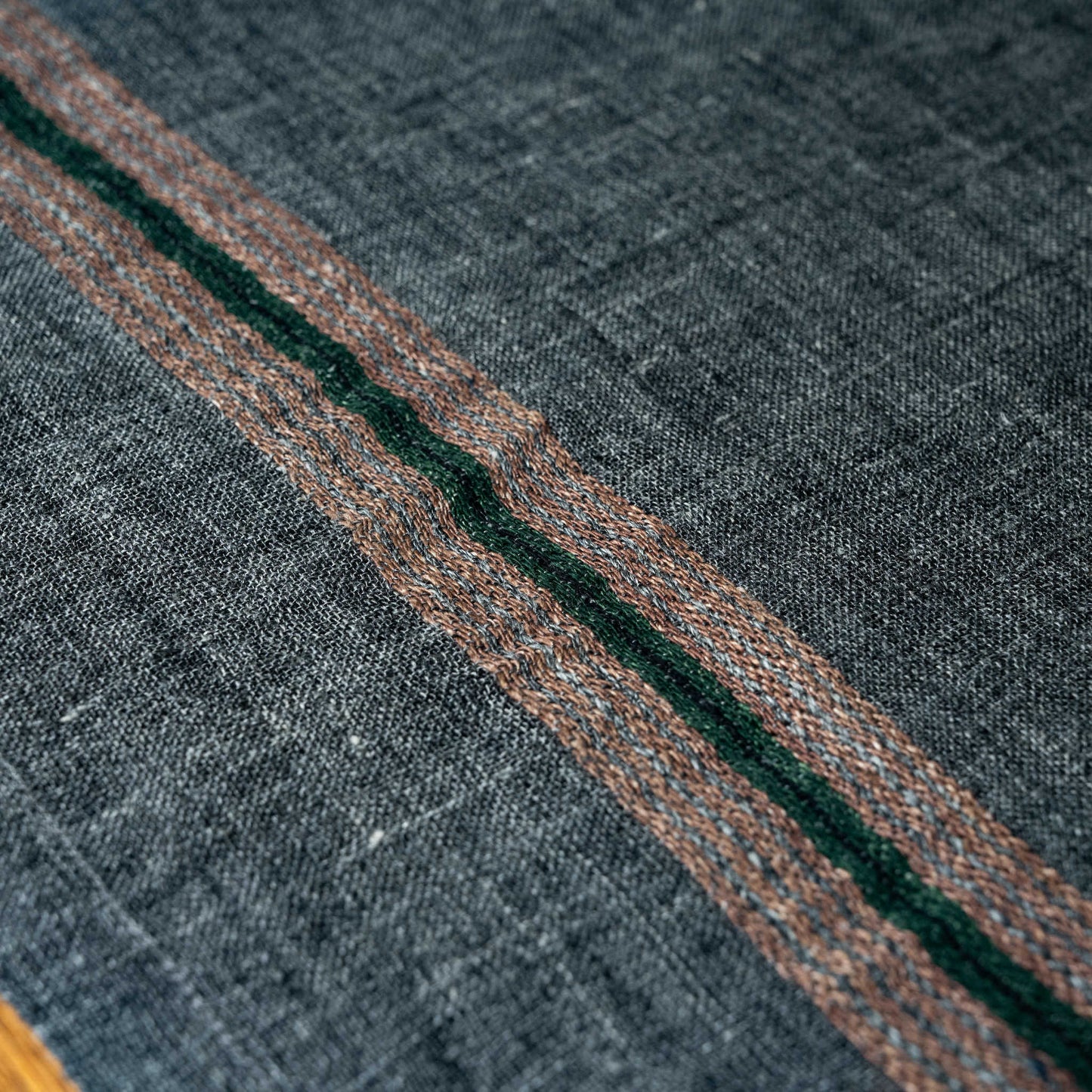 Libeco Arlo linen napkin, close up detail of brown & green stripes