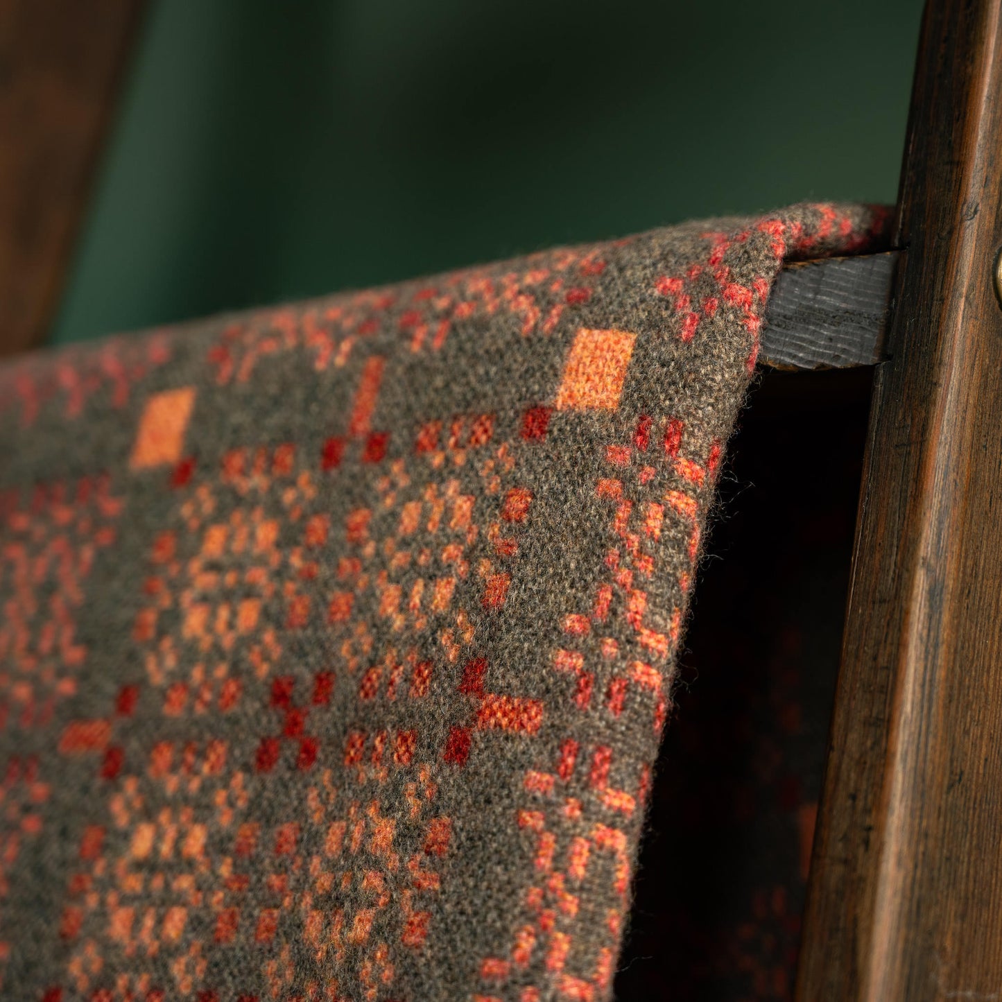 Close of of Melin Tregweynt Knot Garden blanket in copper colourway