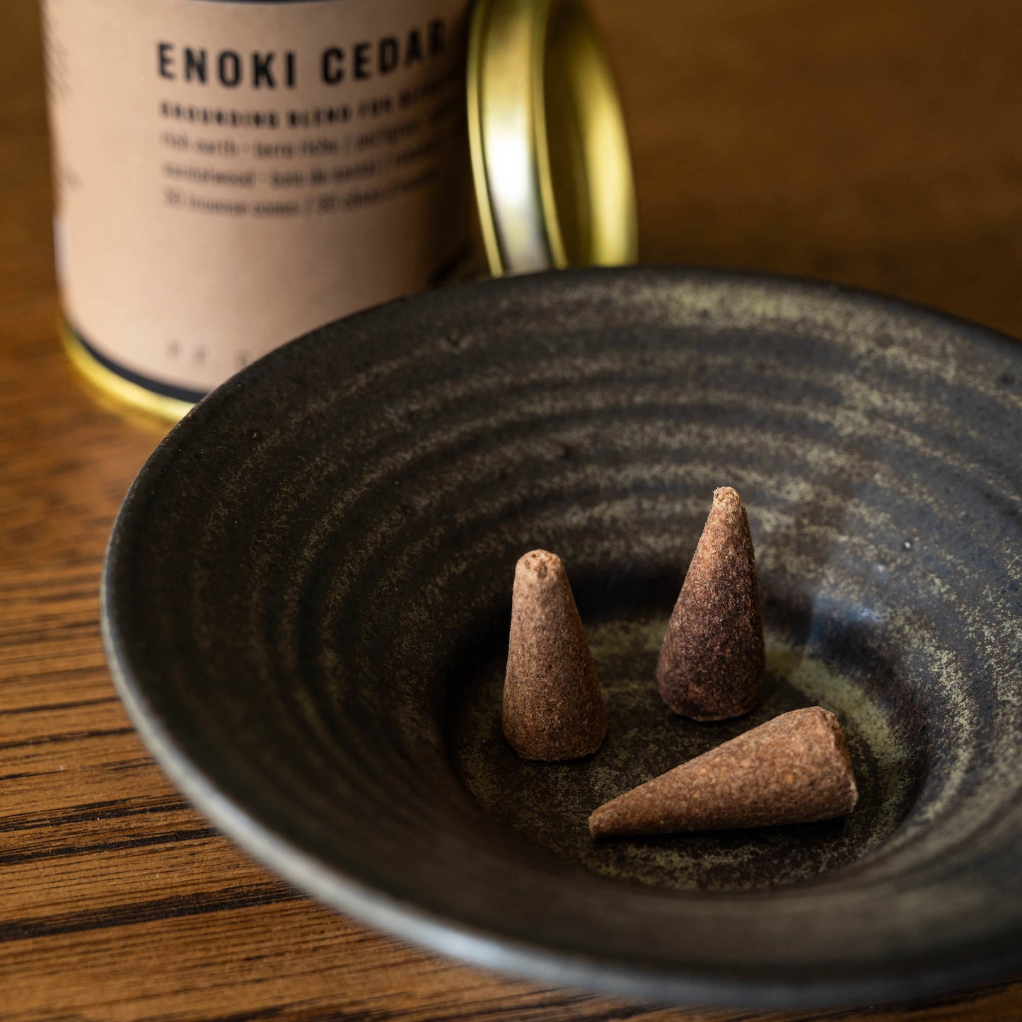 noki Cedar PF Candle Co incense cones & Pottery West Stoneware stumpie candle holder.