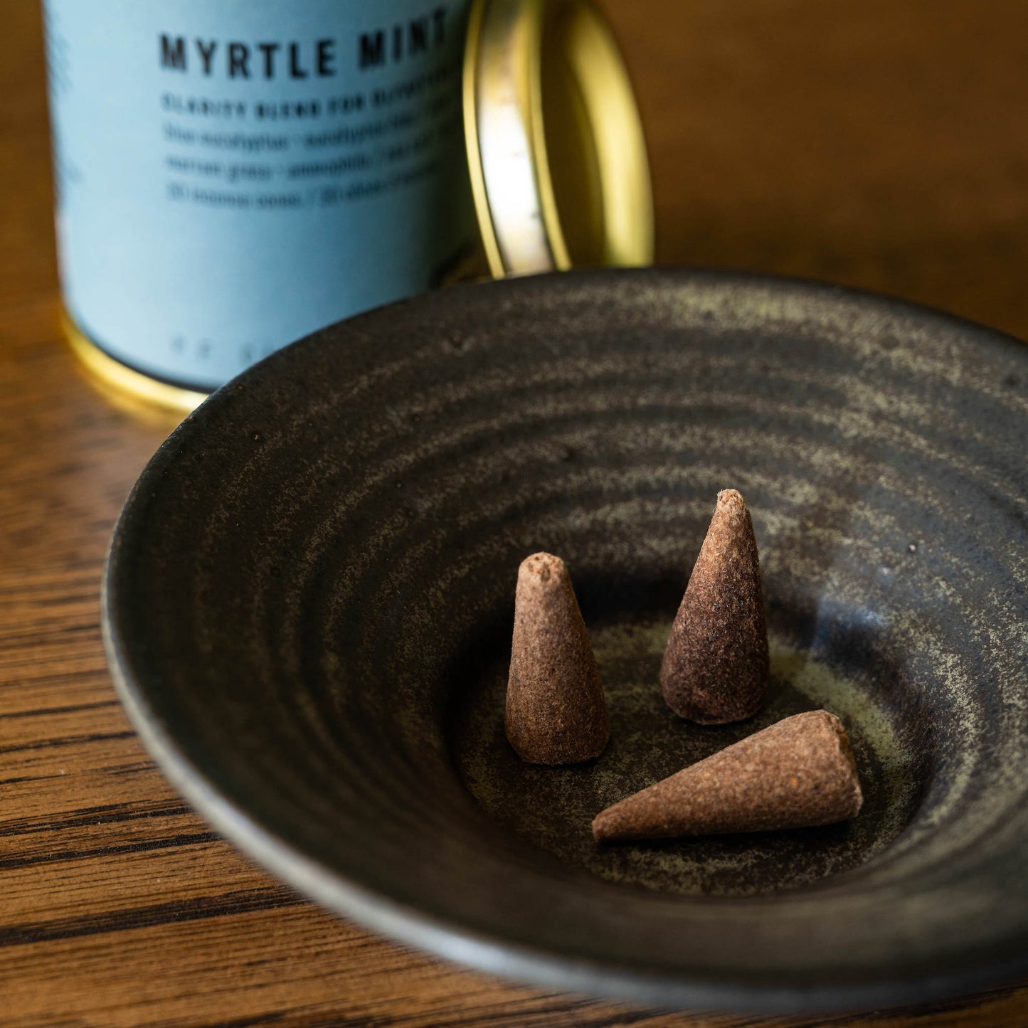 Myrtle Mint PF Candle Co Incense cones in stoneware stumpie candle holder.