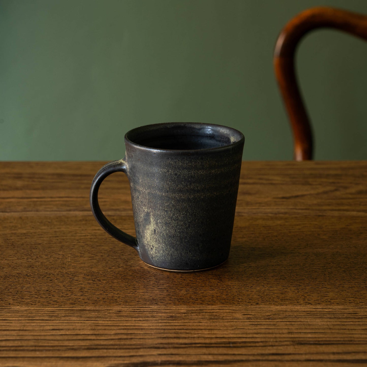 Pottery West Stoneware Tapered Mug in Charcoal Glaze.