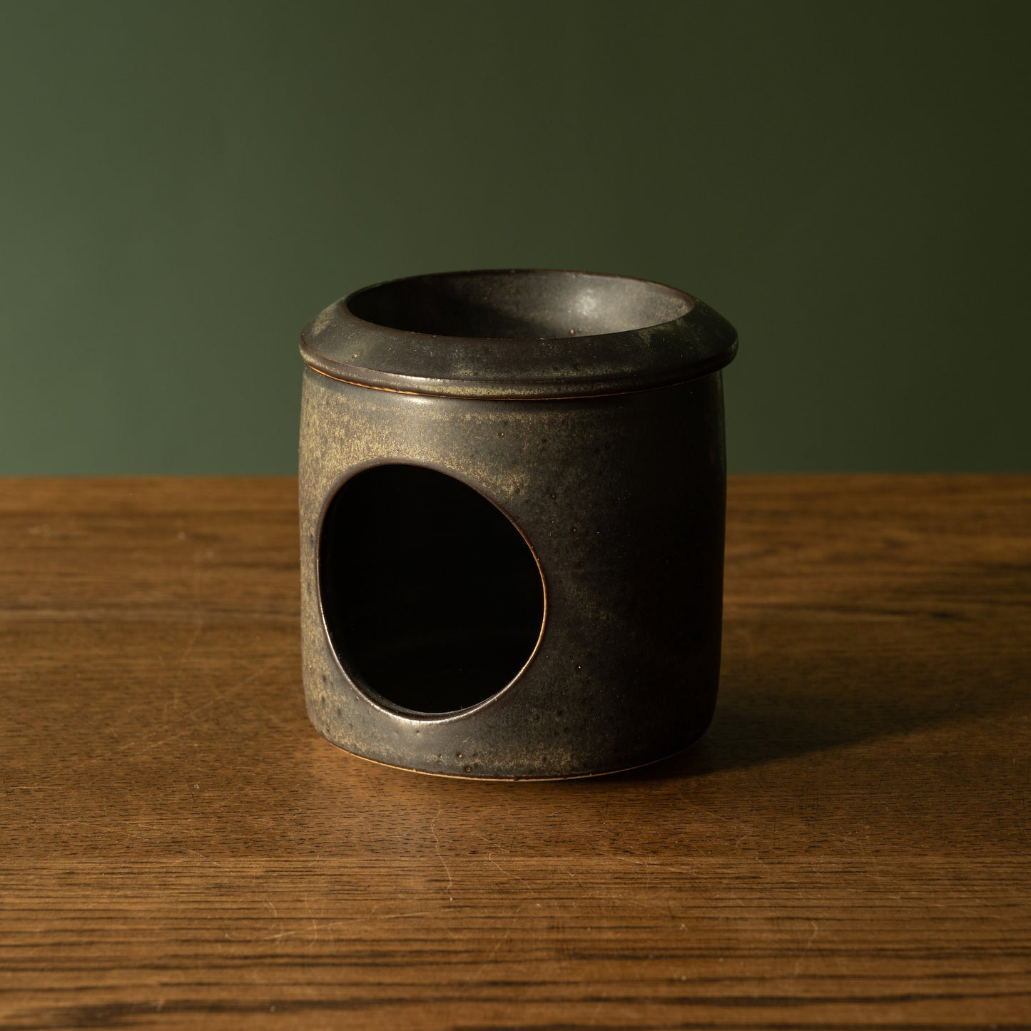 Pottery West stoneware oil warmer in charcoal glaze.