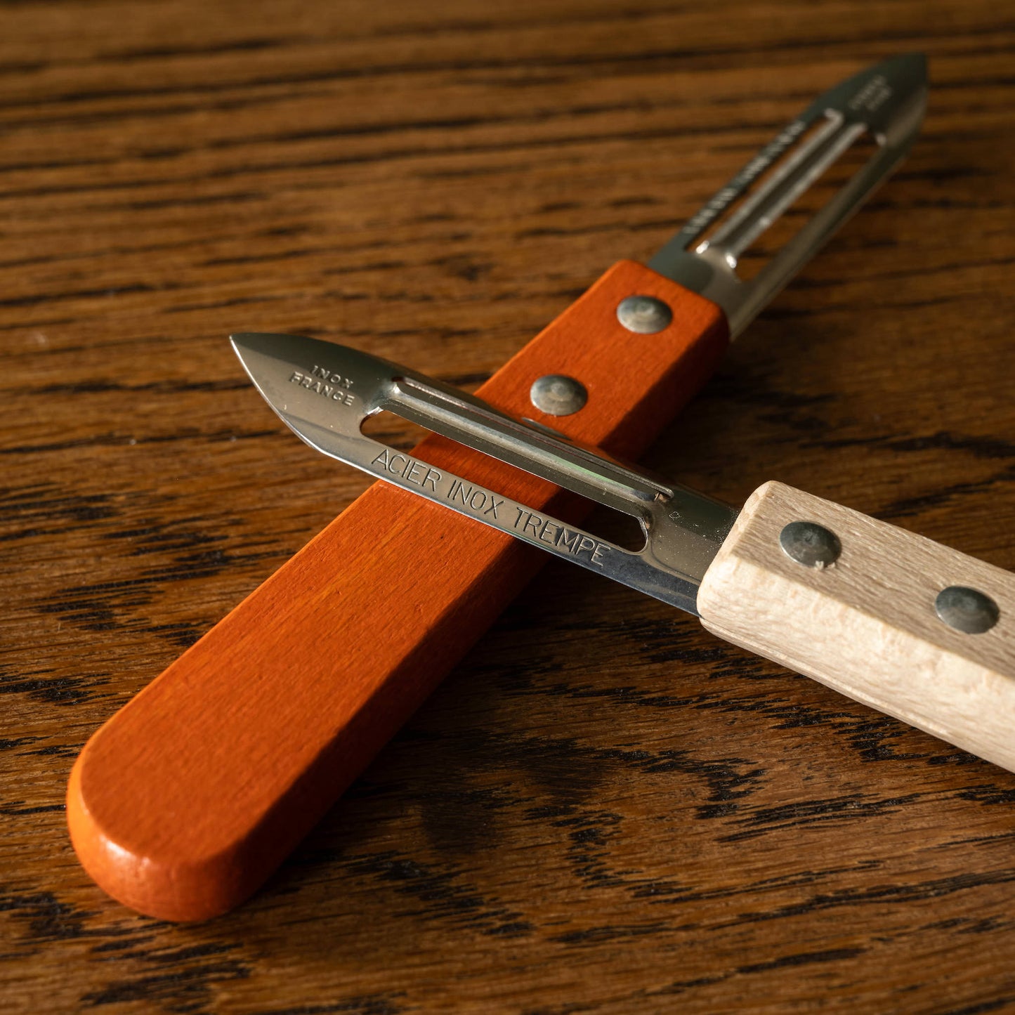 Vegetable peelers with wooden handles