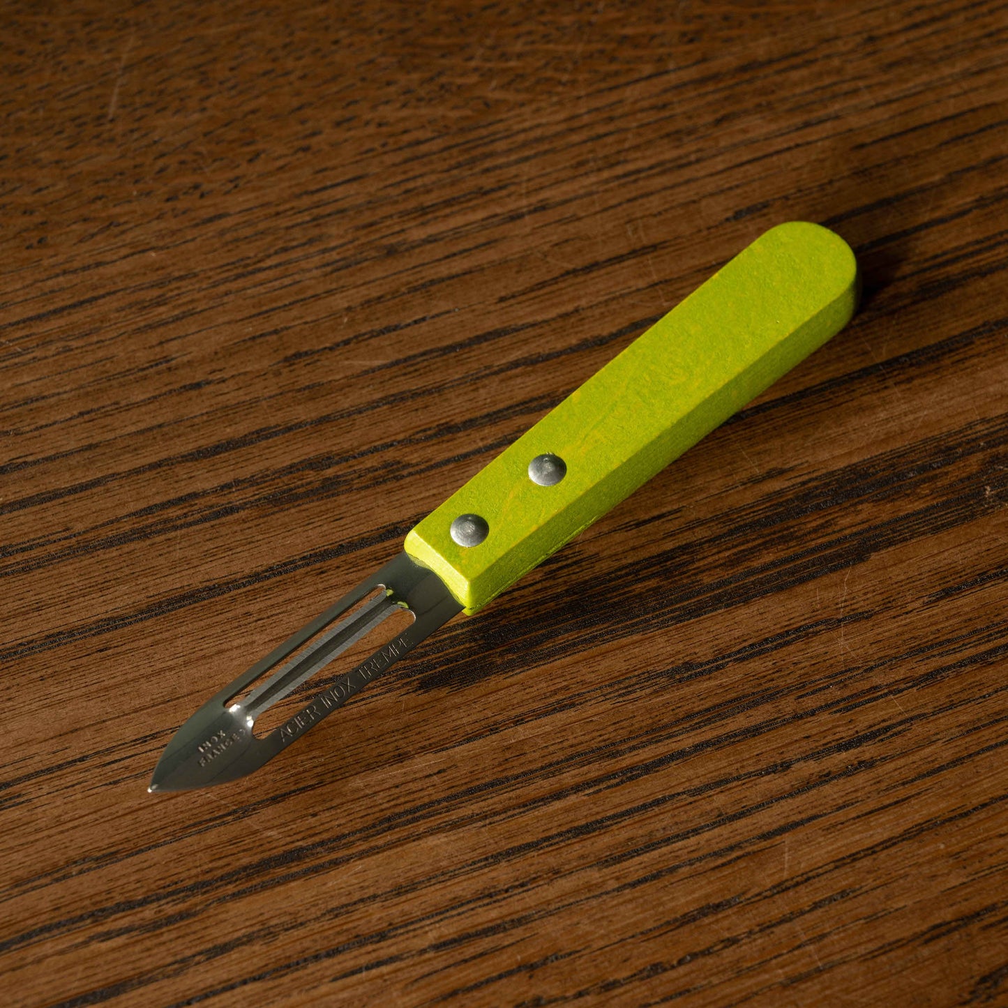 Roger Orfevre Vegetable Peeler with Lime coloured wooden handle
