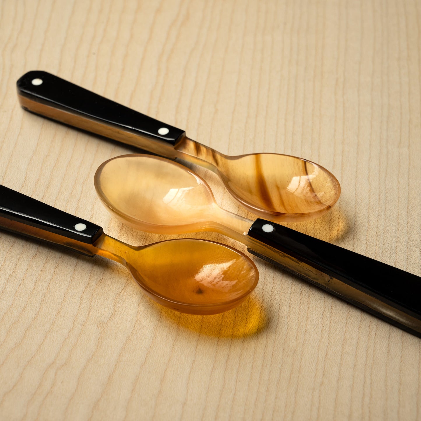 Assortment of Sarah Petherick Chunky Teaspoons in Black & Natural Horn.