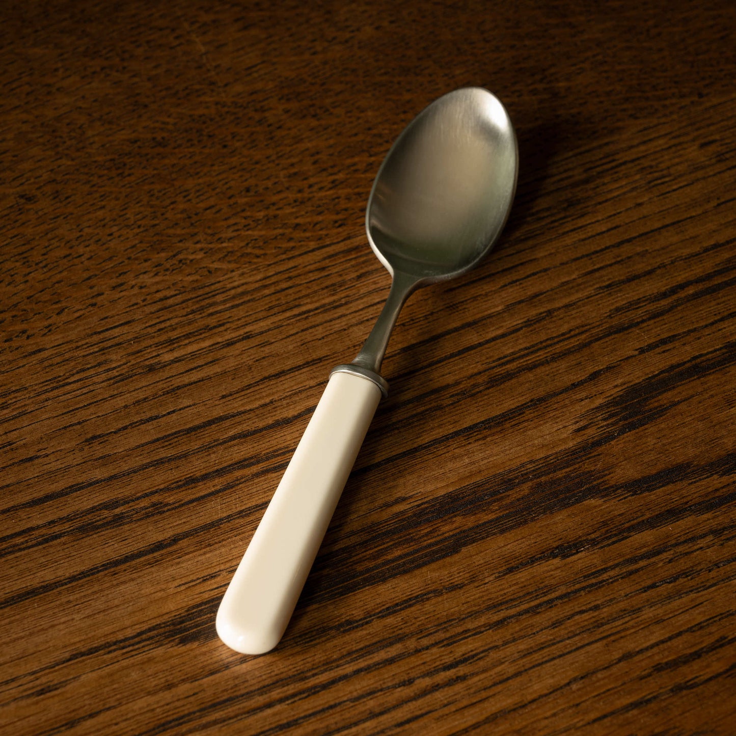 Tricketts of Sheffield Cream Handled Dessert Spoon