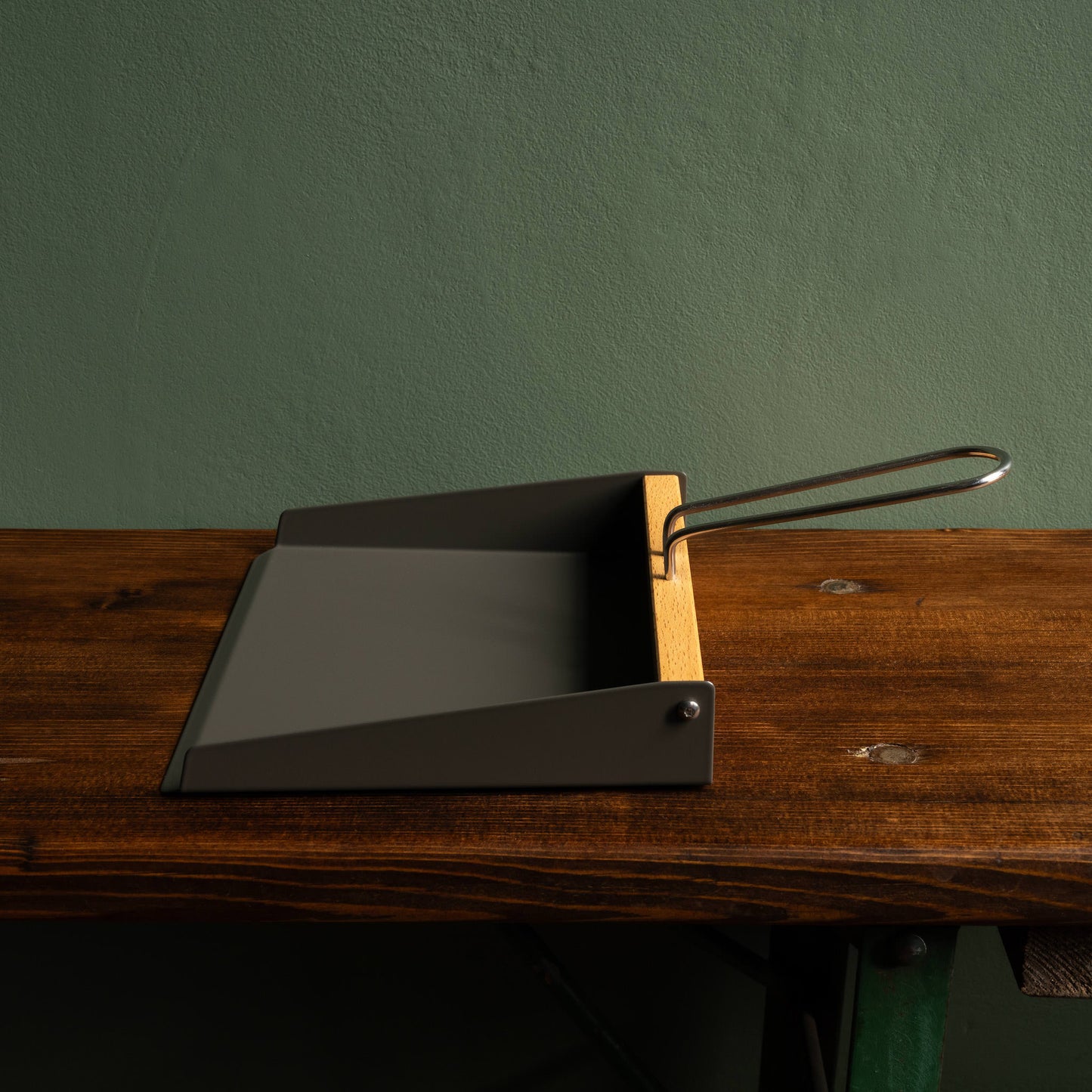 Side view of Turner and Harper steel dustpan