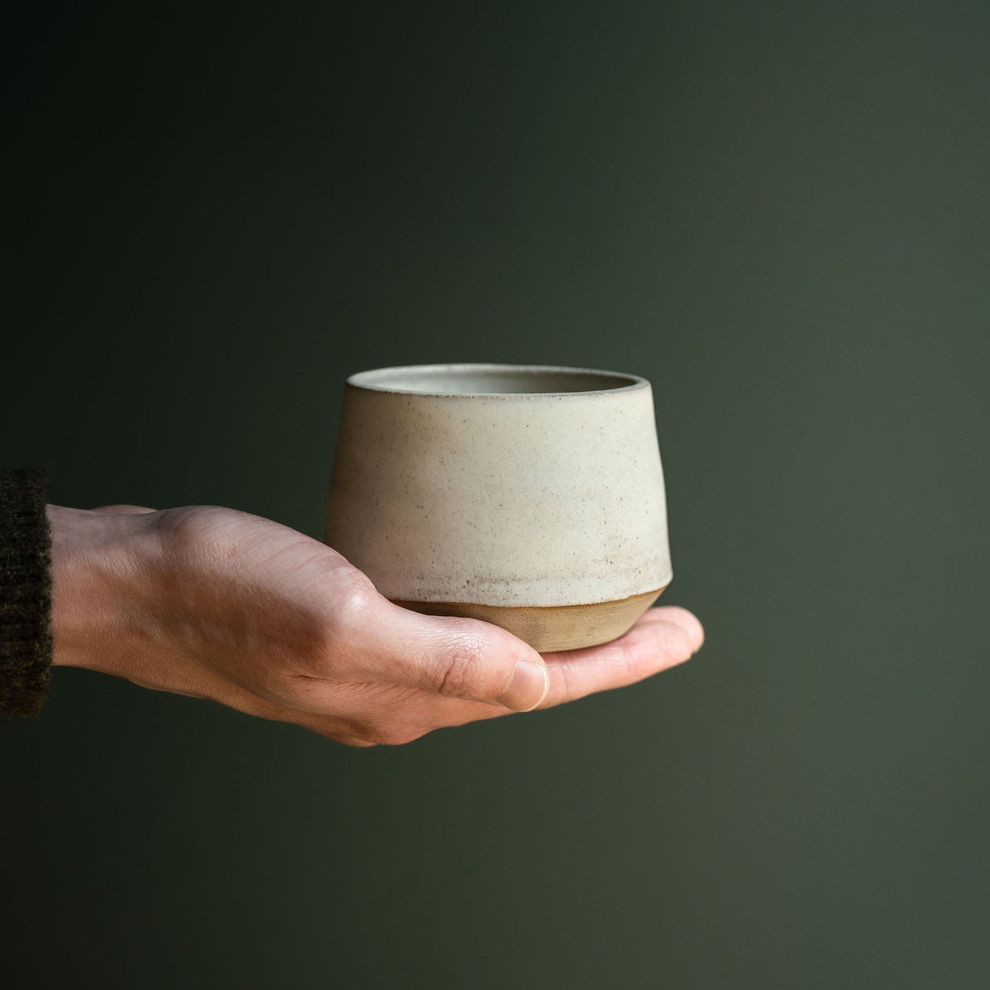 Carrick Ceramics Short Almond Glaze Tumbler in hand