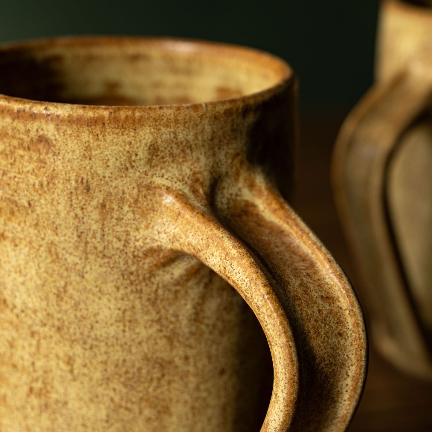 Handle close up of Carrick Ceramics Tall Stoneware Mug in Toast glaze colour