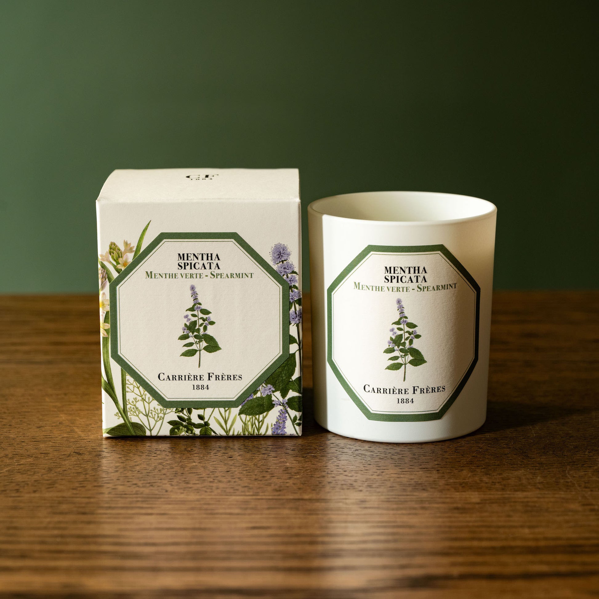 Carrière Frères scented candle and box.