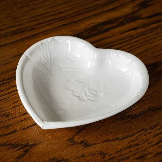 Carron Paris Pivoine Heart Shaped Dish with embossed peony flower design finished in a milky white glaze. 