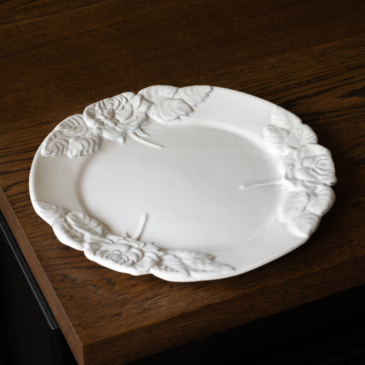 Carron Paris large white ceramic decorative plate with floral rose patterns on a wooden surface