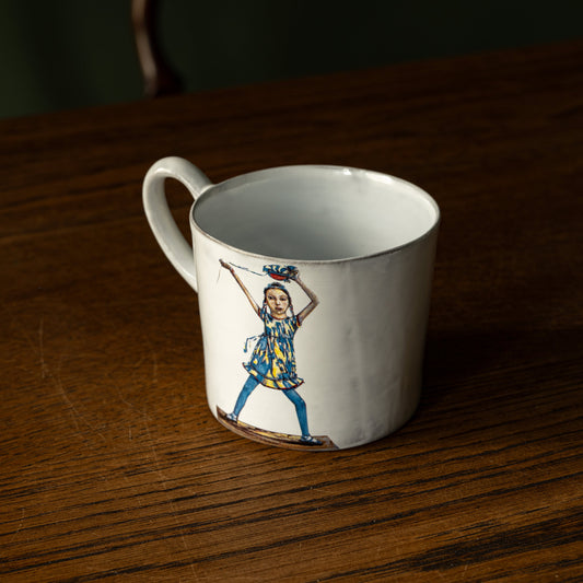 Carron Paris white mug with a decorative design of a dancing woman 