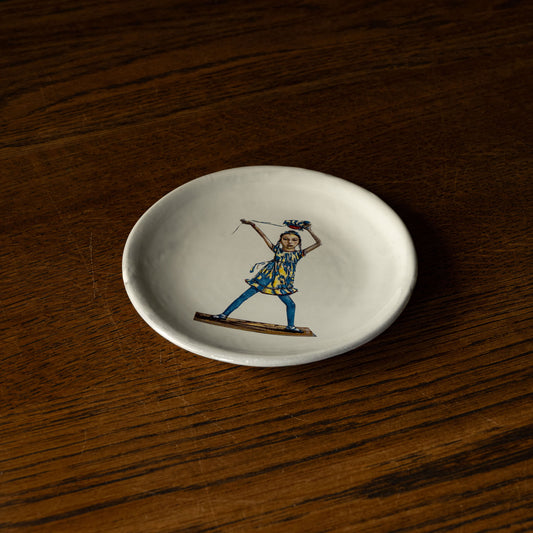 Carron Paris small white plate with a colourful illustration of a dancing woman 