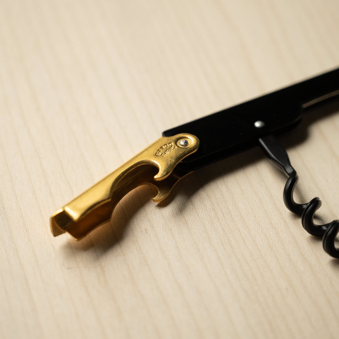 Cartailler Deluc Gold Bottle Opener tool.