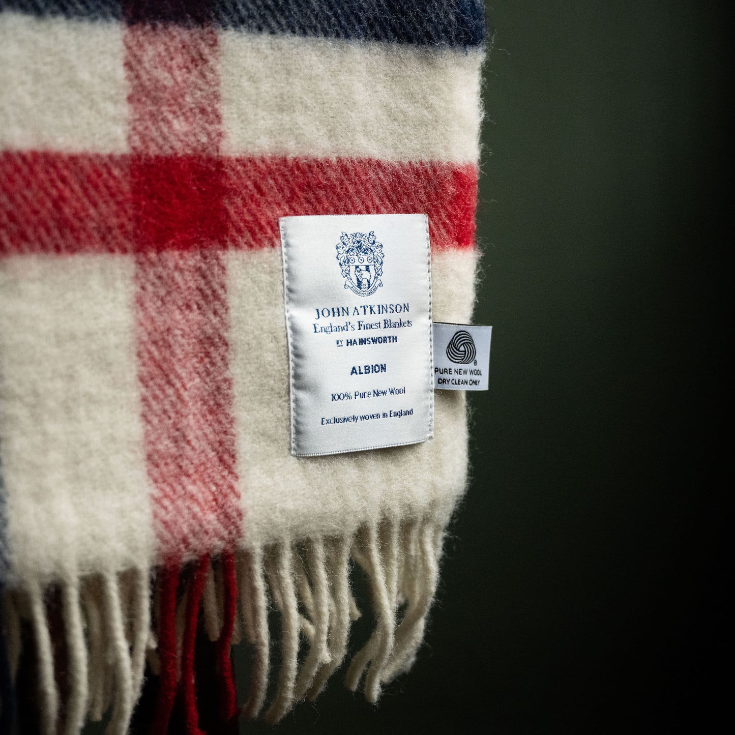 Care instruction and label for John Atkinson Albion Pure Wool Throw.