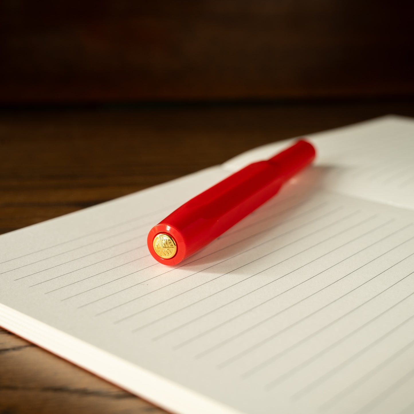 Kaweco Sport Red Rollerball lid with gold branding accents