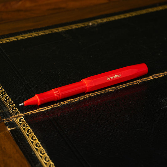 Kaweco Sport Rollerball pen in red with lid off and attached to end of barrel