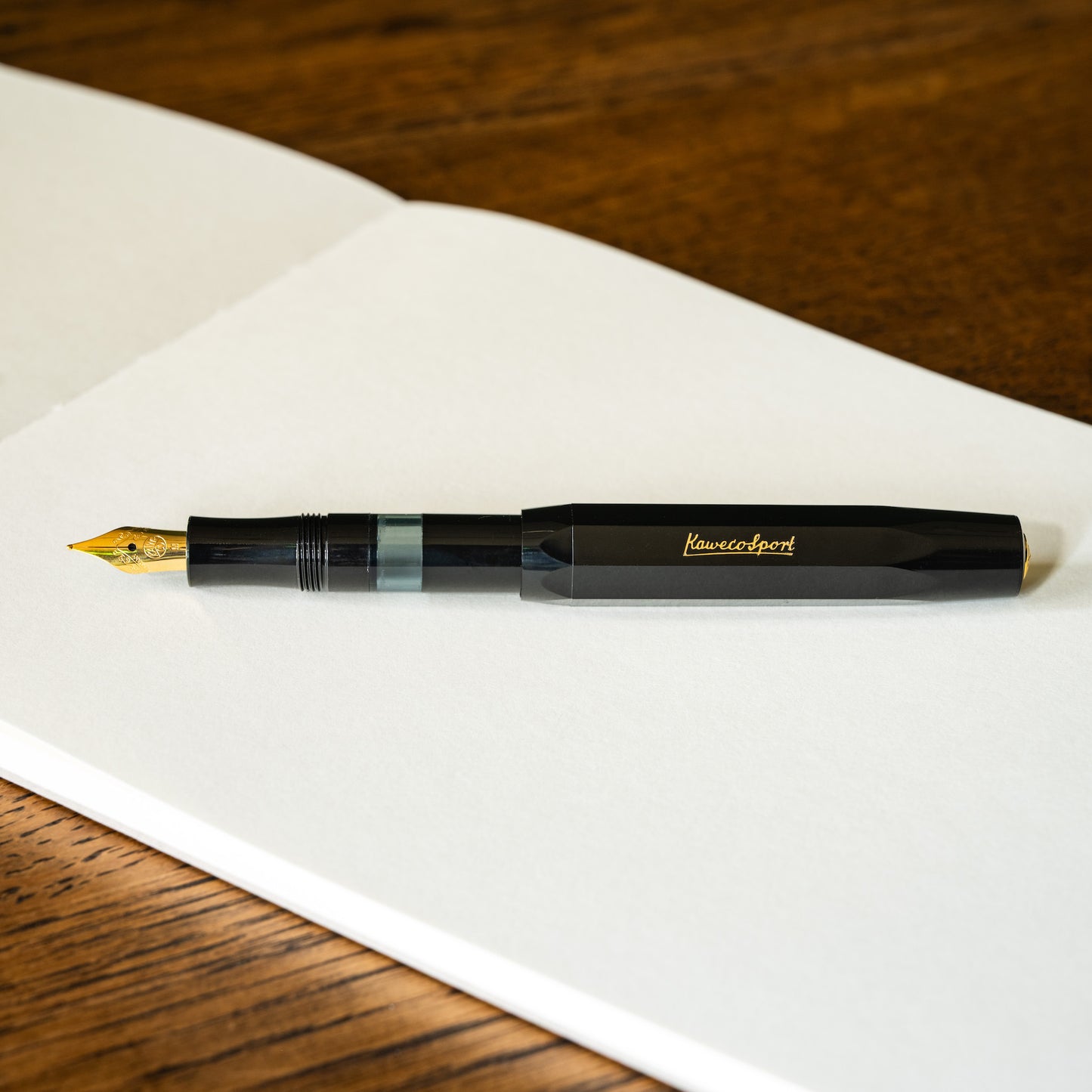 Kaweco Piston Sport Classic pen with lid posted on body. 