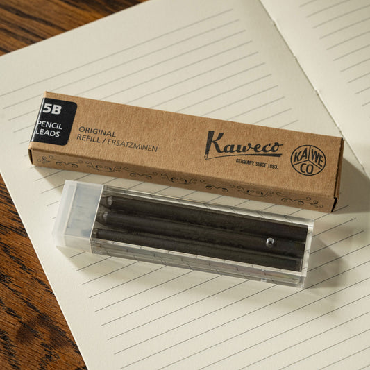 Kaweco 5.6mm pencil lead box with 3 leads on a lined notebook page