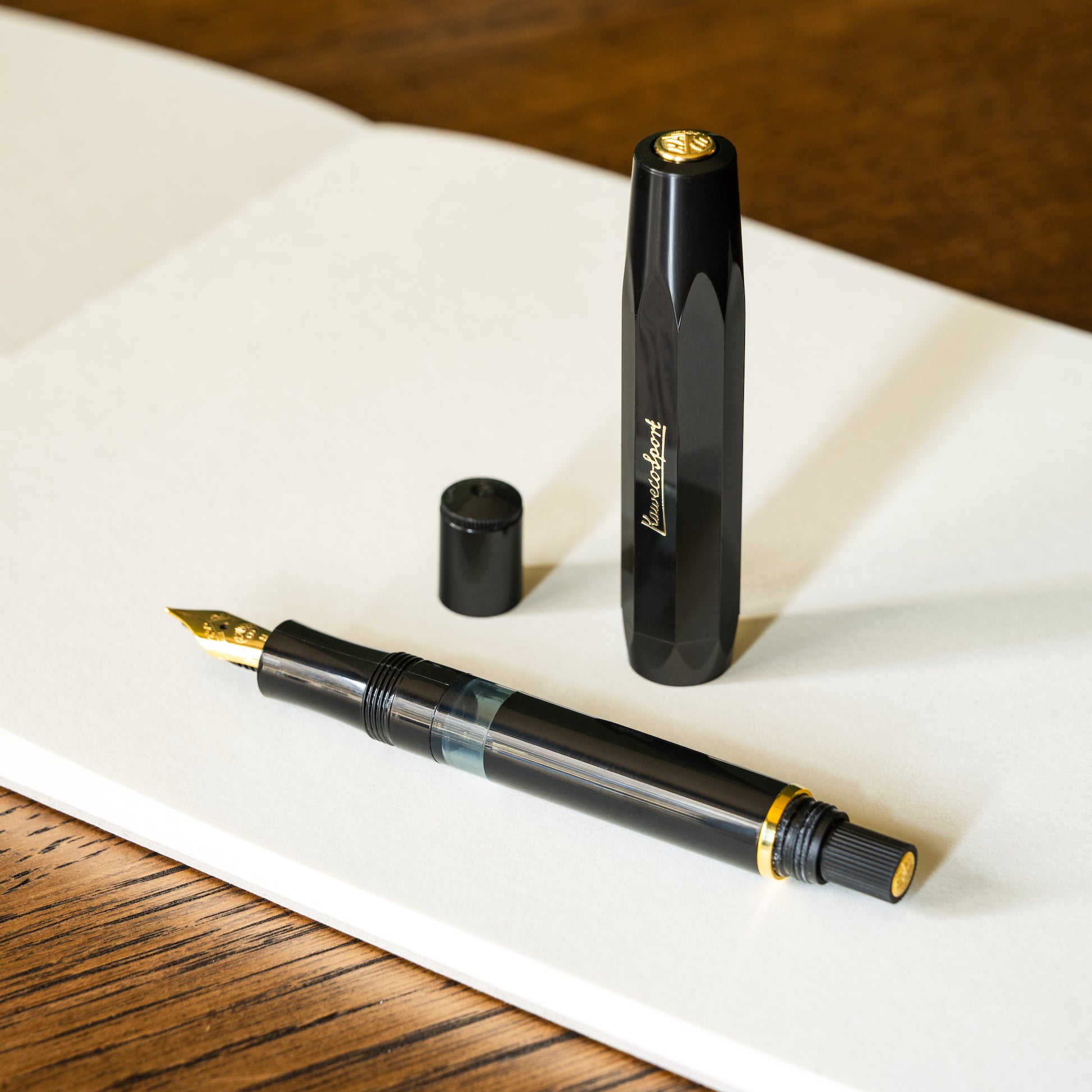 Kaweco Piston Sport Classic Pen with lid off & cap of piston mechanism removed.