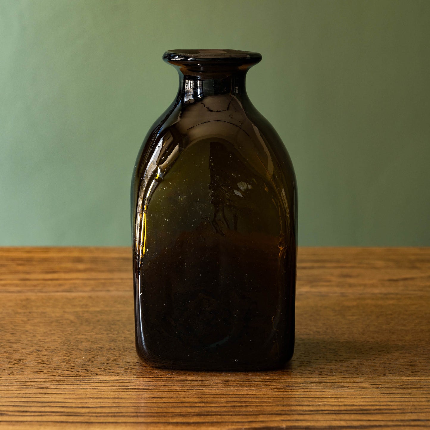La Soufflerie Bouteille Carre Petit. A beautiful and versatile dark brown free blown glass bottle.  