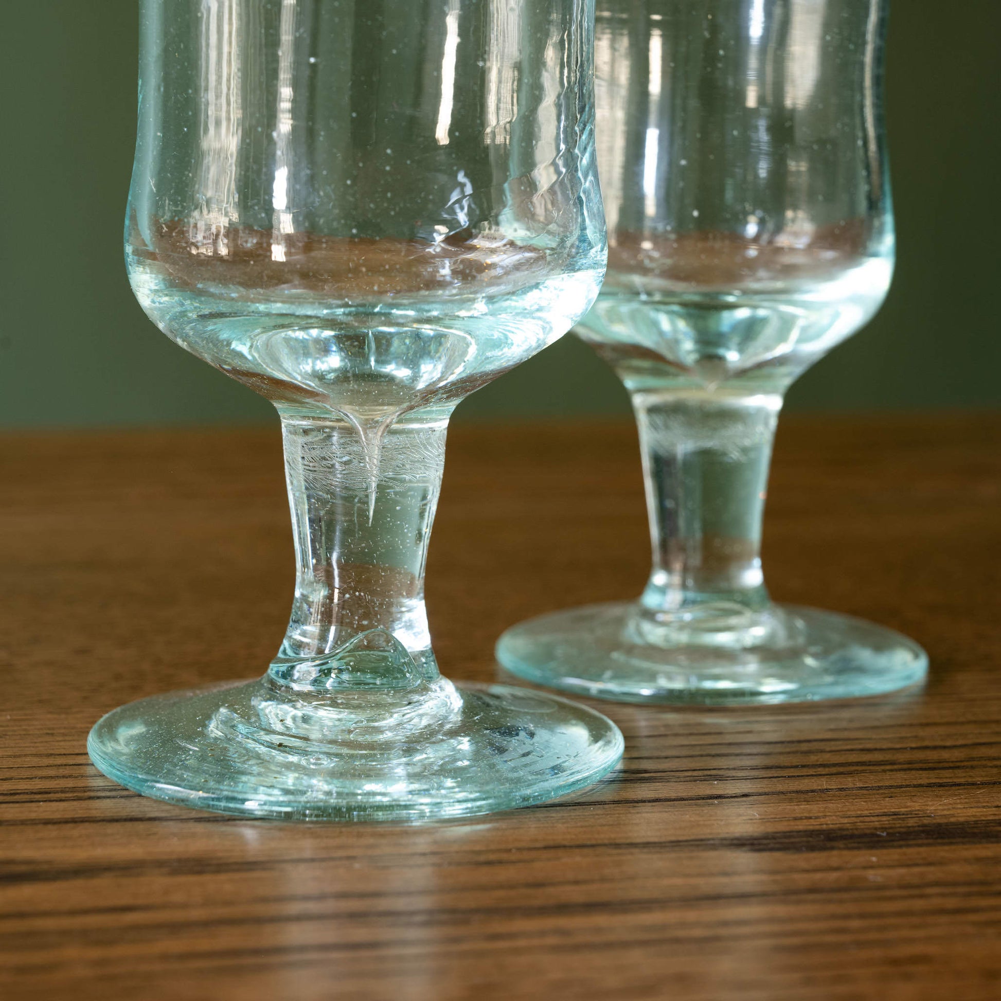 Stem & base of pair of La Soufflerie Baby Bordeaux wine glasses. Mouth blown from recycled glass. 
