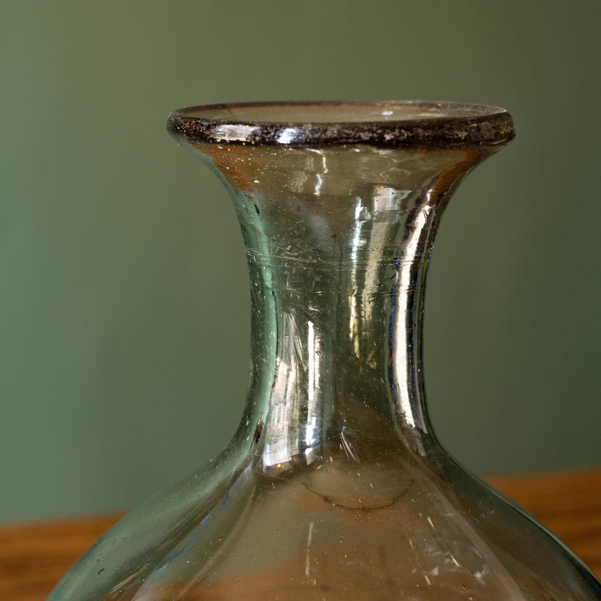 Neck of La Soufflerie Bistro Rond. Mouth blown carafe or vase in smoked recycled glass. 