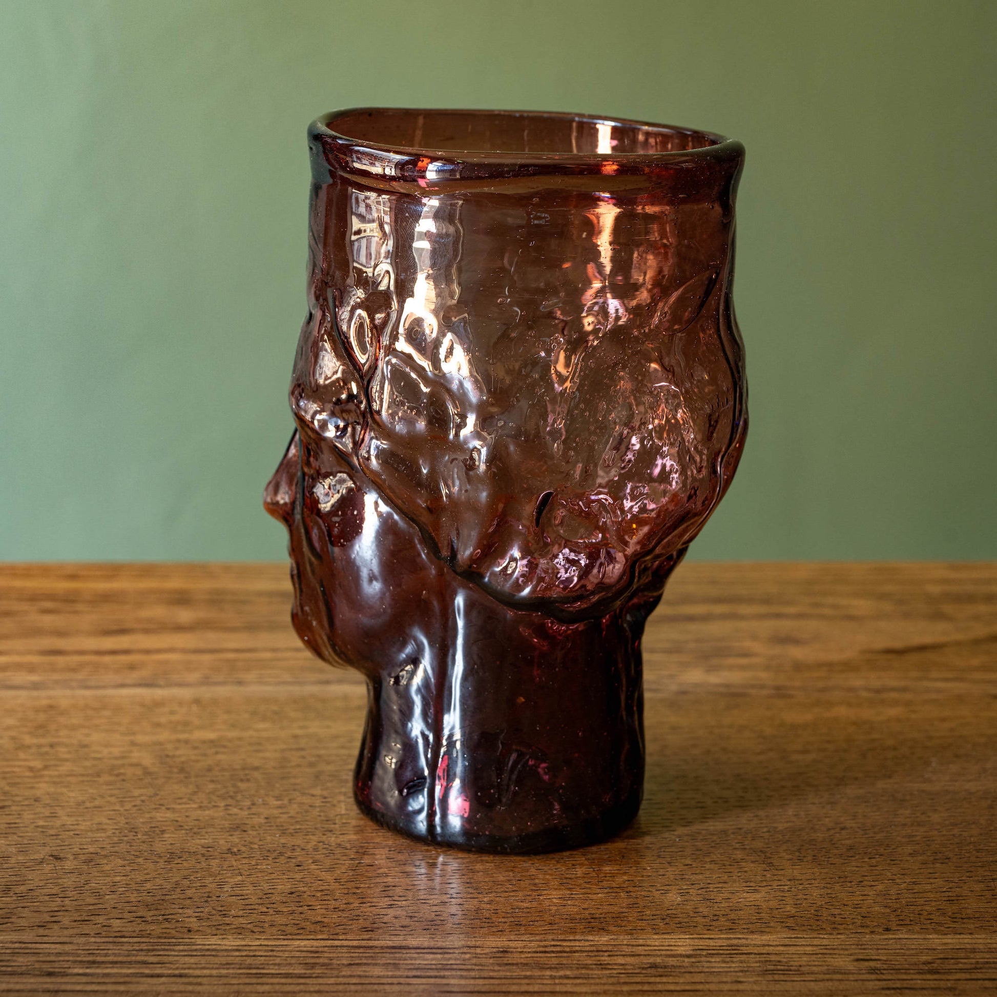 Side and back view of La Soufflerie Roma Vase. Mouth blown recycled glass in framboise colour.