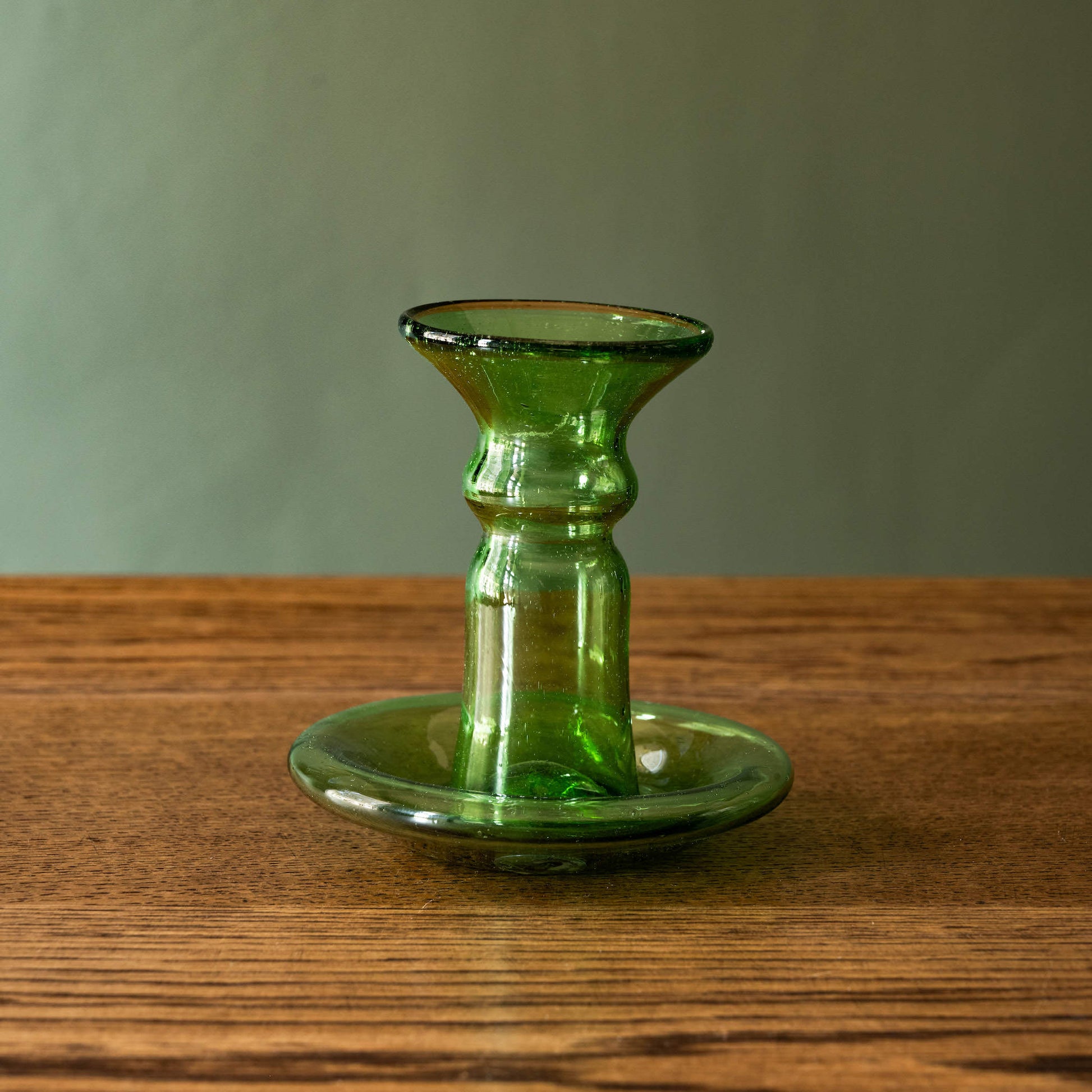 La Soufflerie small glass candlestick in green recycled glass. 