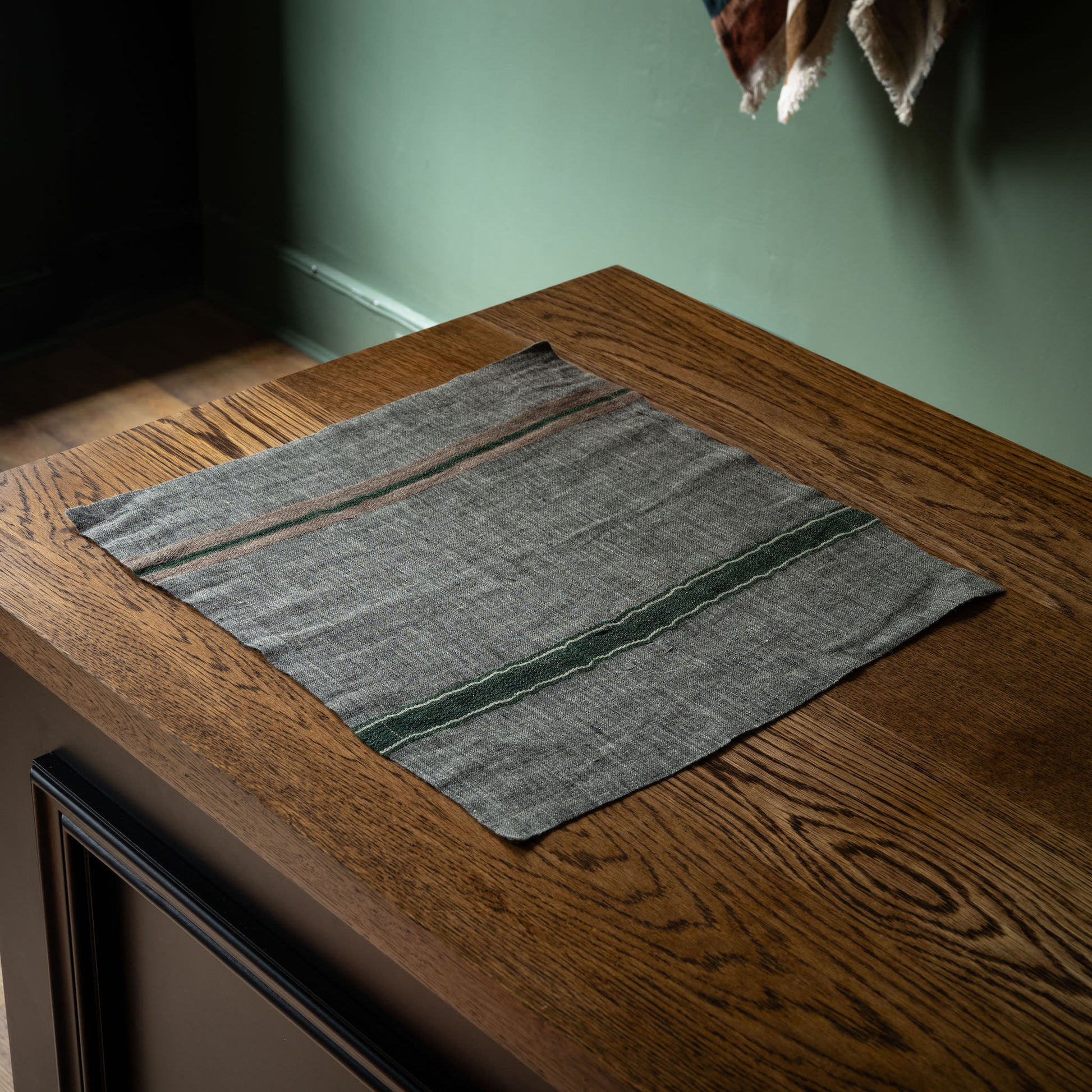 Libeco Arlo grey linen napkin, with stripes at either end.