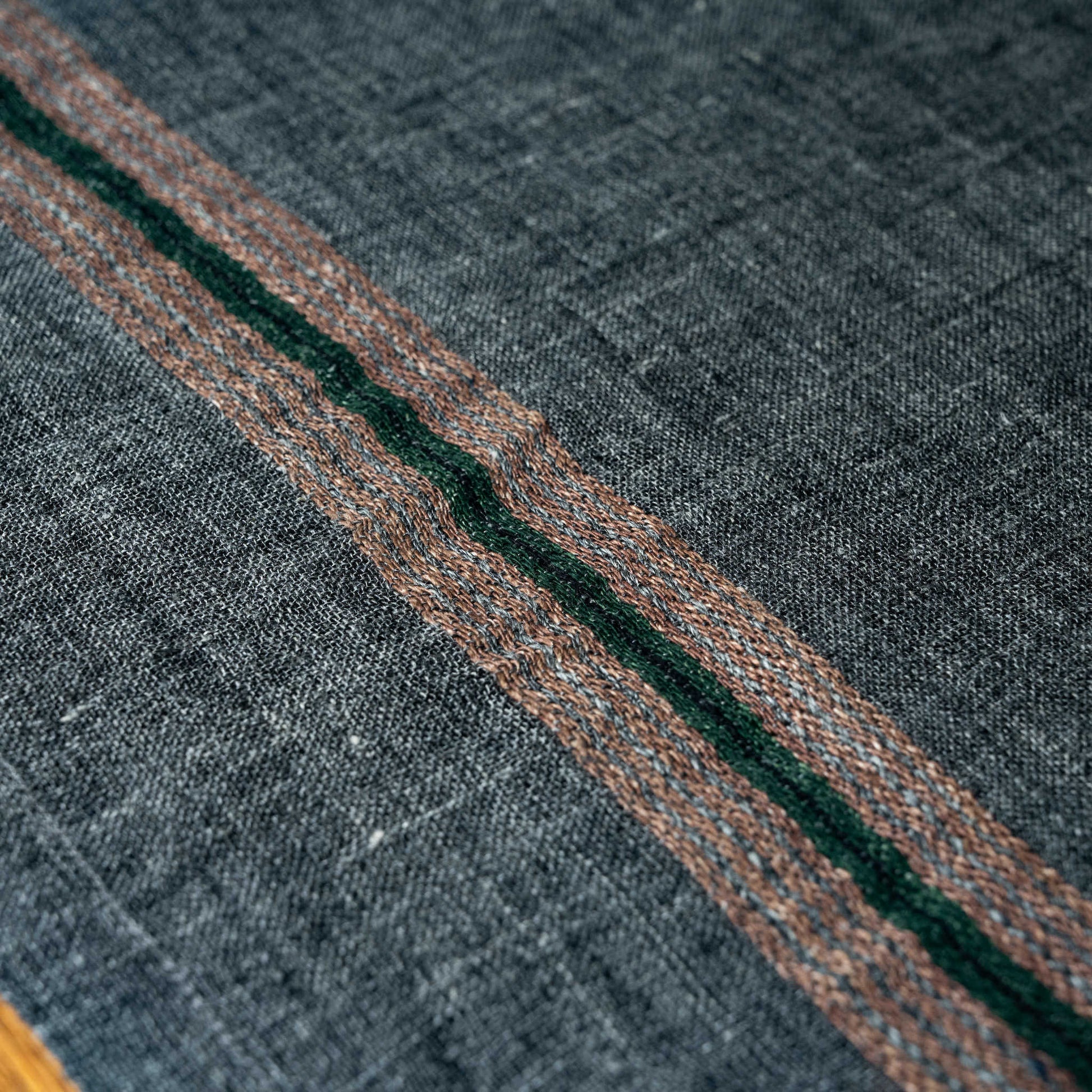 Libeco Arlo linen napkin, close up detail of brown & green stripes