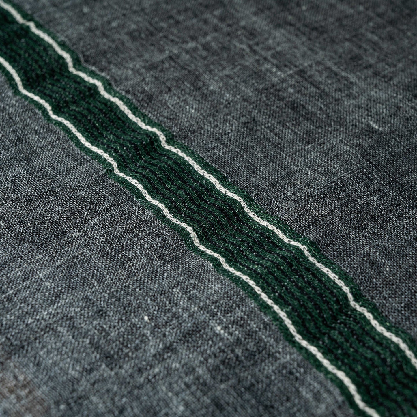 Libeco Arlo linen napkin showing close up of green & cream stripe detail