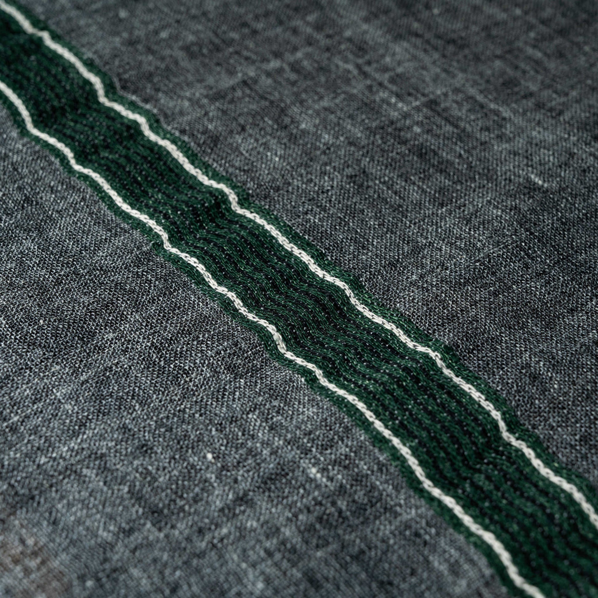 Libeco Arlo linen napkin showing close up of green & cream stripe detail