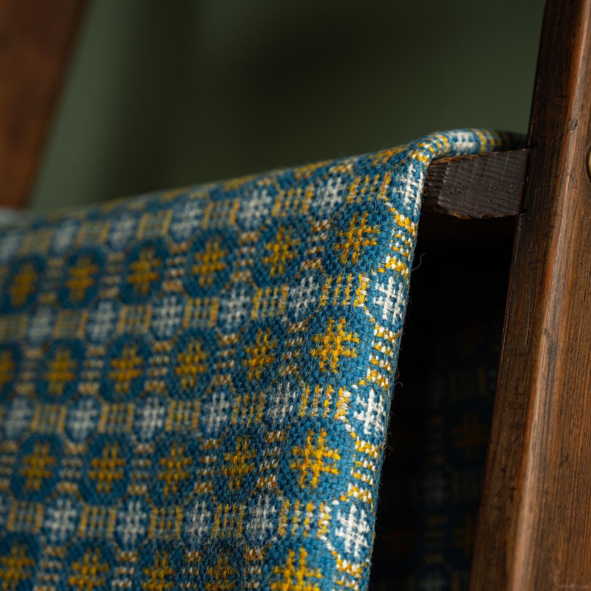 Close-up of Melin Tregwynt Teils Welsh Blanket geometric design