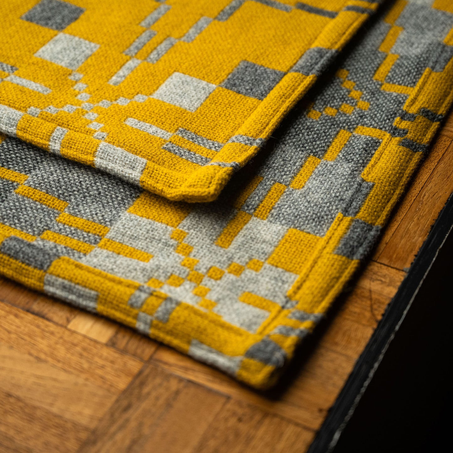 Weave and hem detail of Melin Tregwynt Vintage Star Welsh Blanket in Gorse  colourway.