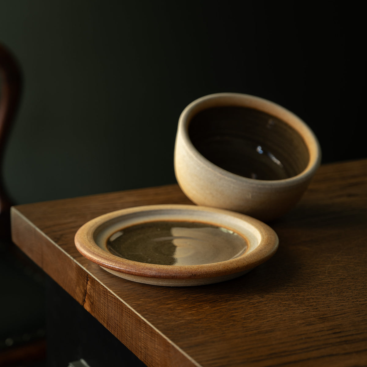 Muchelney Pottery two part butter dish, with lidded dome off the plate showing glazed interior. 