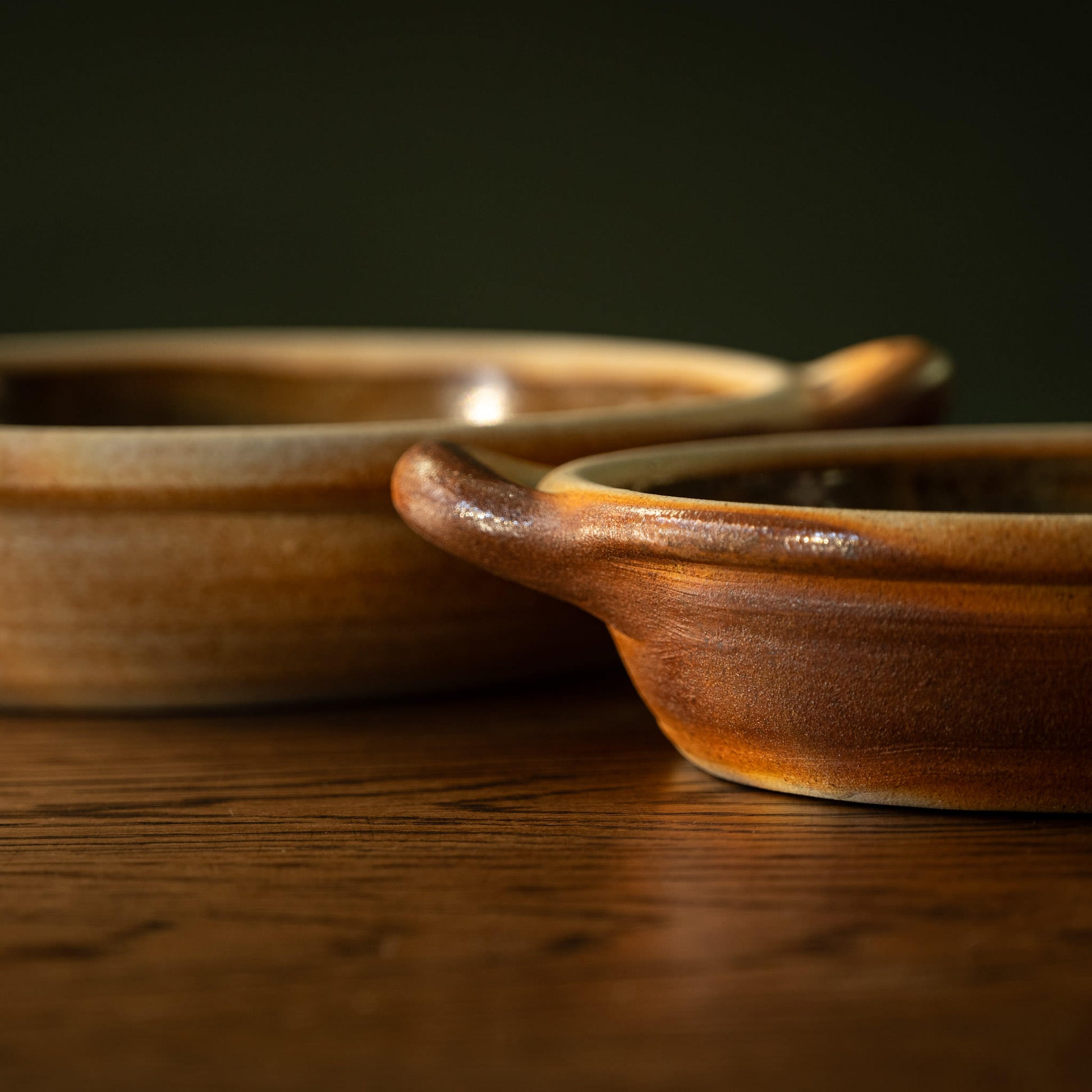 Muchelney Pottery Shallow baking dishes showing the depth of each dish. 