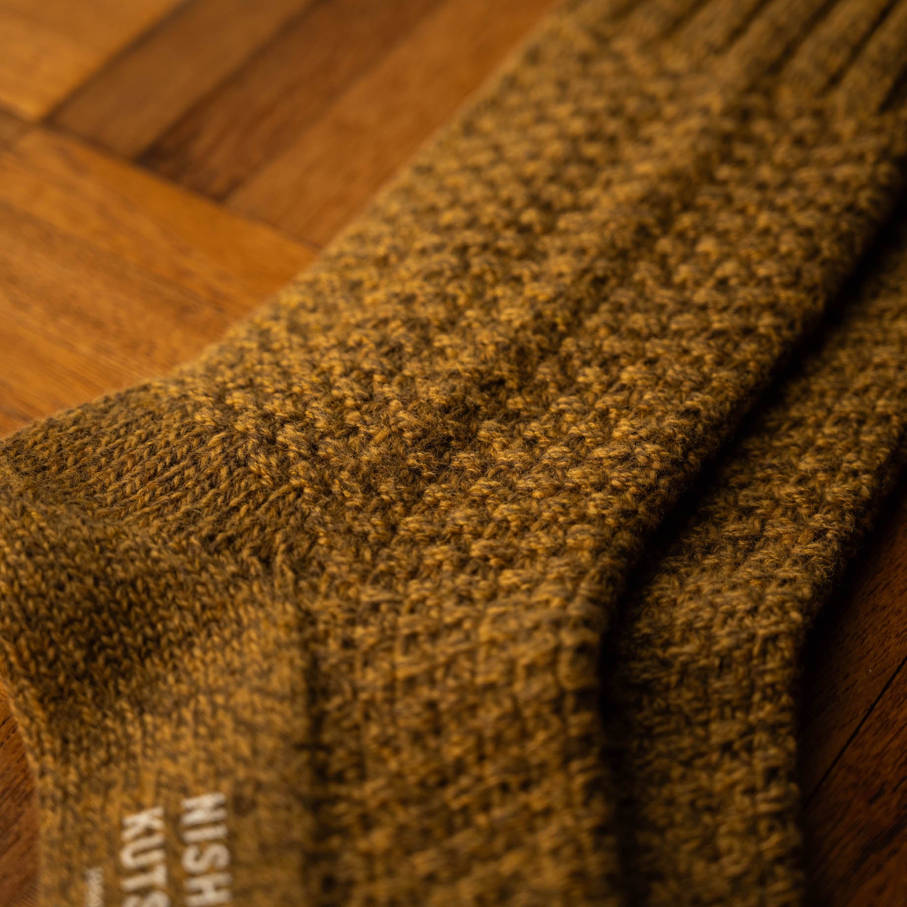 Colour and yarn detail for Mustard Nishiguchi Kutsushita Wool & Cotton Boot socks