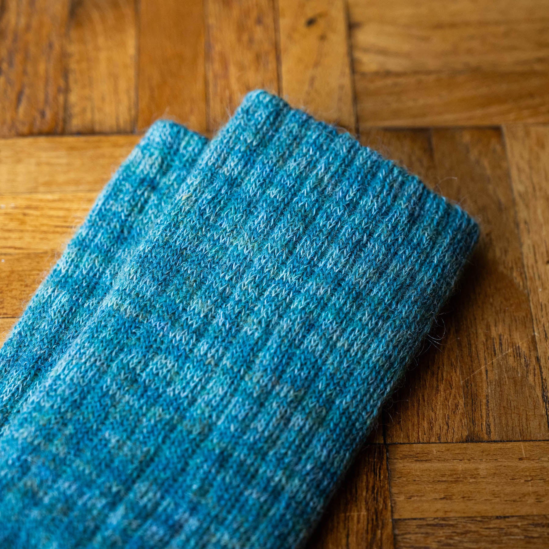 Turquoise Blue cuff detail  of Nishiguchi Kutsushita Trail Road mohair & wool sock 