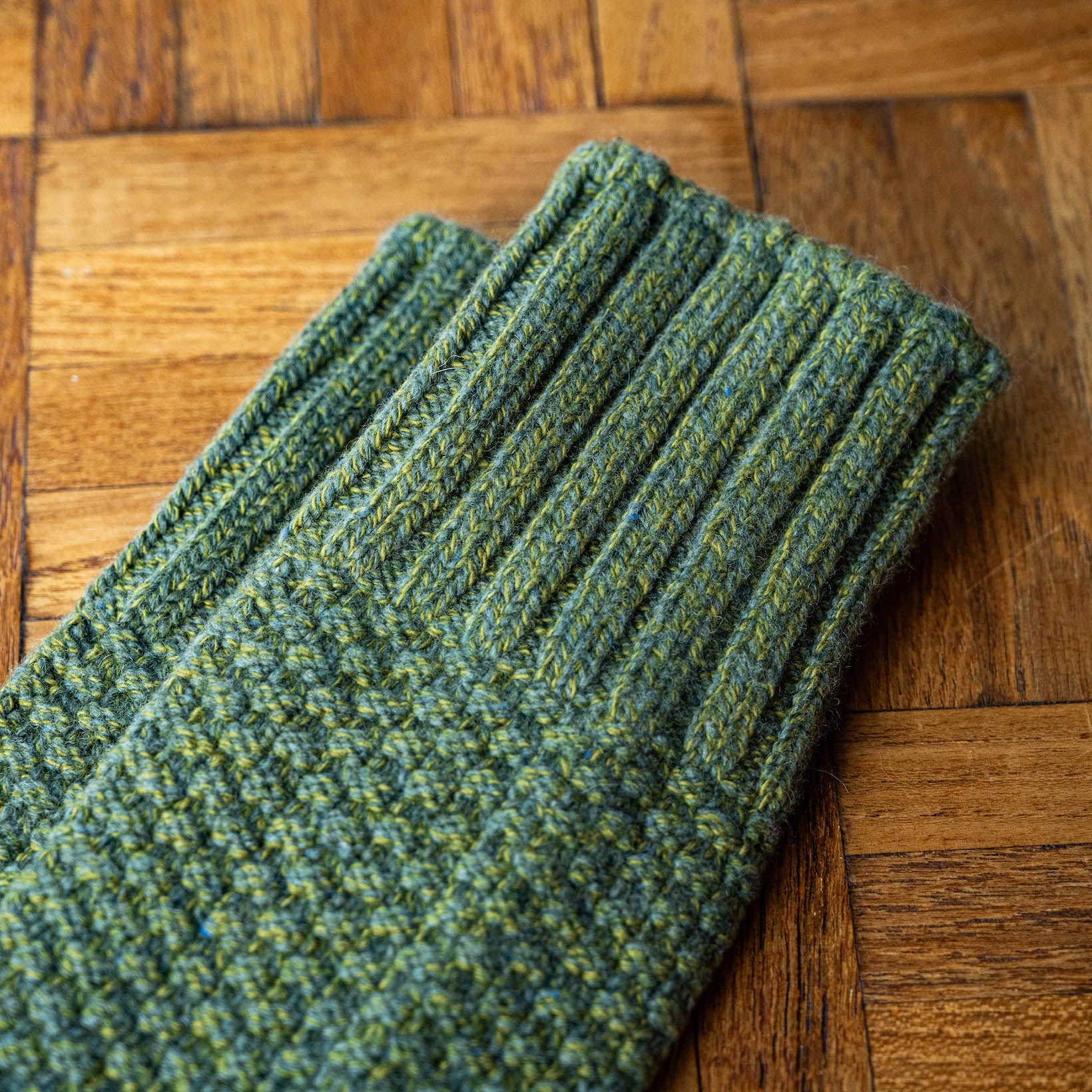 Cuff detail of Nishiguchi Kutsushita Moss Green Wool Boot Socks