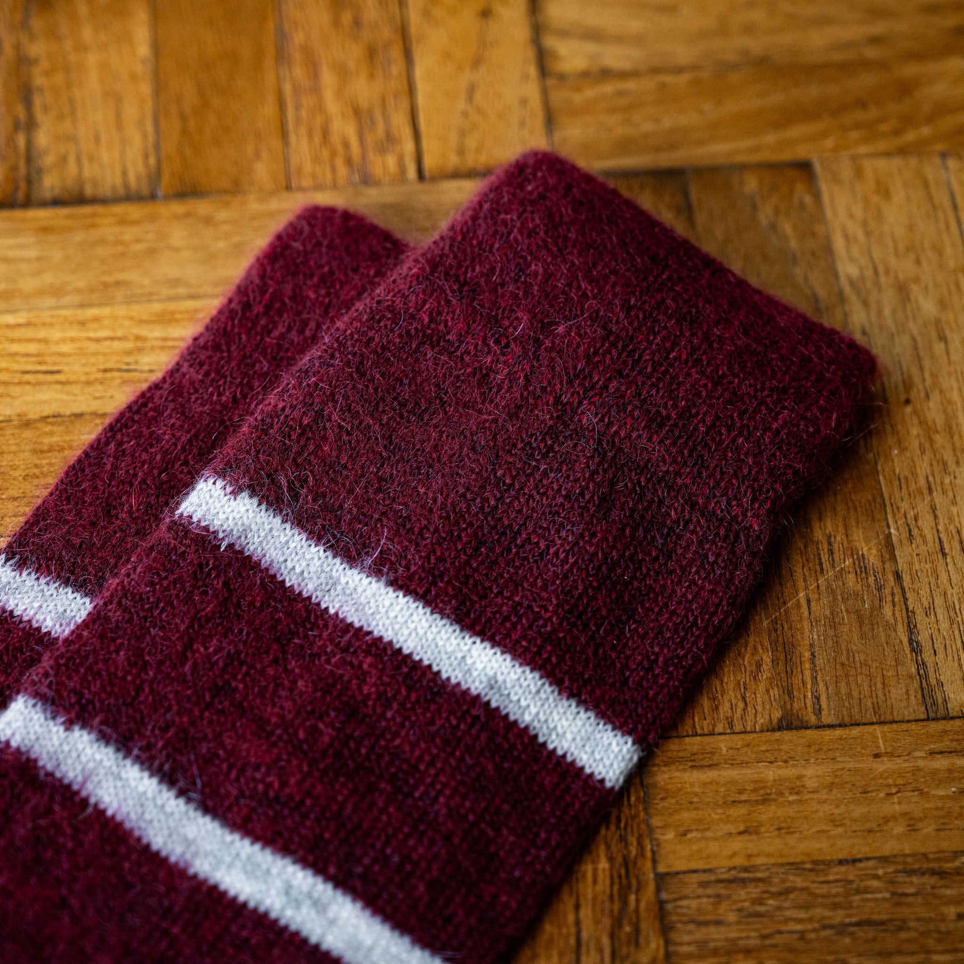 Cuff of Nishiguchi Kutsushita Wine Mohair & Wool socks with white stripes 