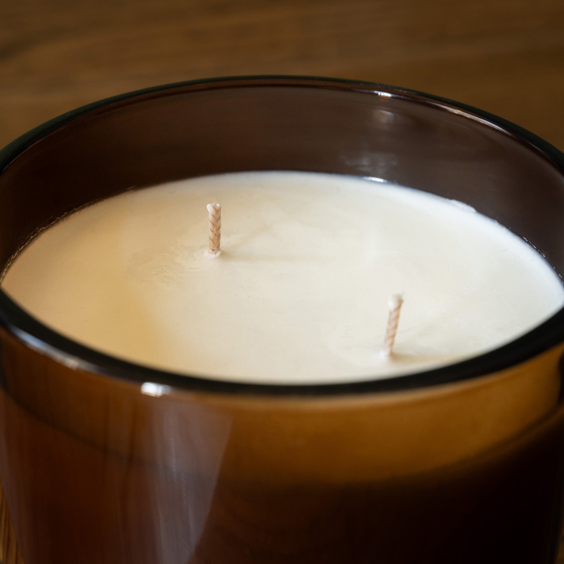 Double cotton wick of PF Candle Co Blonde Hinoki soy wax scented candle.